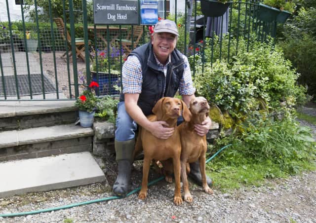 Peter Hodgson with his dogs.