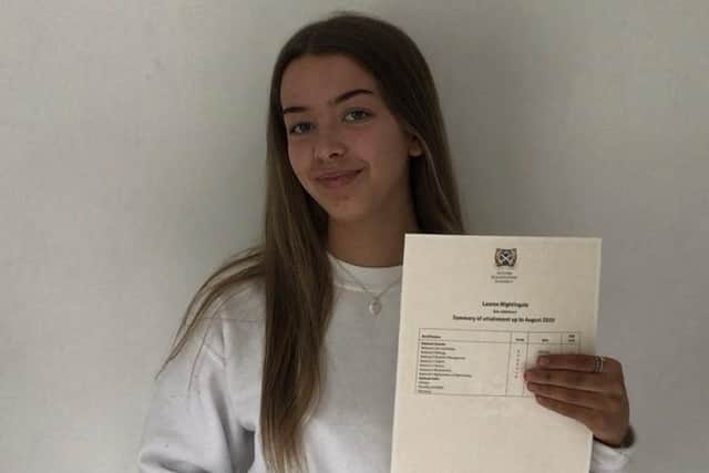 Peebles High School pupil Lauren Nightingale with her SQA exam results.