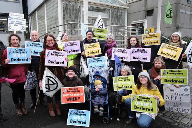 Extinction Rebellion activists staging a demonstration outside a Scottish Borders Council meeting in January.