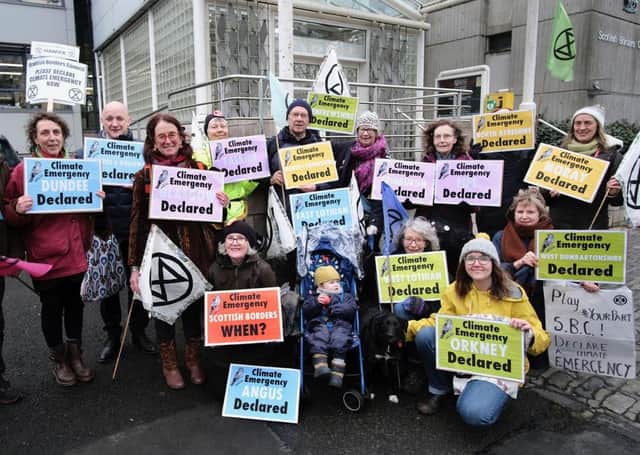 Extinction Rebellion activists staging a demonstration outside a Scottish Borders Council meeting in January.