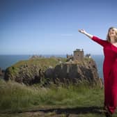 Scottish singer, song-writer and broadcaster Fiona Kennedy on the clifftop overlooking Dunnottar Castle. Photo: Jane Barlow/PA Wire