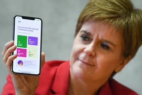 First Minister Nicola Sturgeon launching the Protect Scotland app on September 10. (Photo by Jeff J Mitchell/Getty Images)