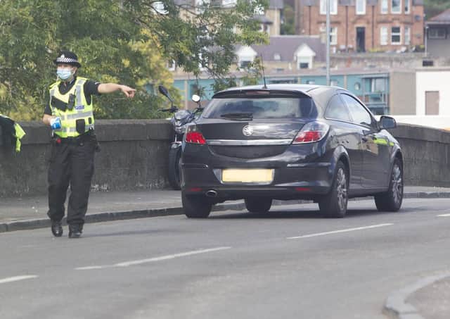 Police at the scene of a collision at Hawick involving a motorcycle. (Photo: Bill McBurnie)