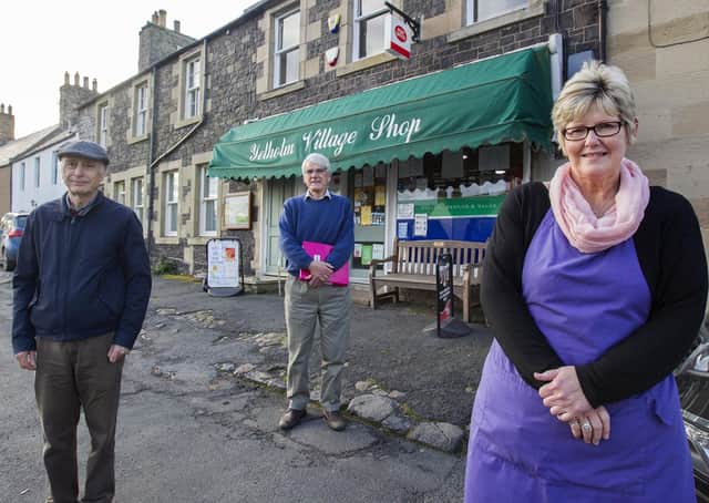 Yetholm Community Shop Limited committee members Graeme Wallace, chairman Alastair Hirst and shop manager Janice Gillies at Yetholm Village shop.
