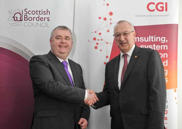 Then council leader David Parker seals the original deal with CGI’s UK president Tim Gregory in 2016.