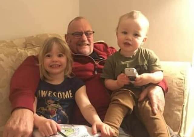 Les Ross, pictured with grandchildren Freya and Conal.