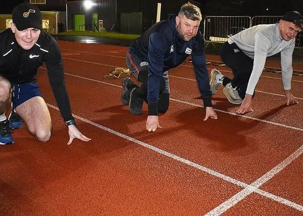 Ryan Cottrell, David Cassidy and Callum Anderson train at the Tweedbank athletics track (picture by John Smail)