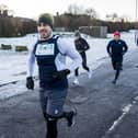 Chris Laidlaw, left, leads his pack of companions in the opening stage of his 12 marathons in 12 months (picture © Craig Watson)