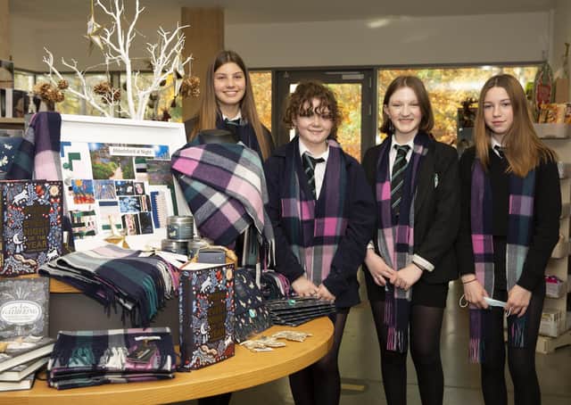 Earlston pupils with their scarves on display at Abbotsford, are from left:  Ella McRae, Nell Green, Rose Gran and Rohan Bell.