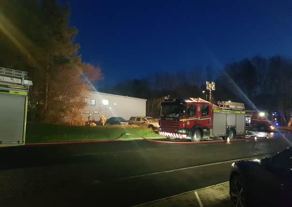 Firefighters attend to a blaze at a storage facility in Melrose Road, Galashiels on Monday.