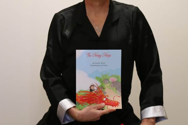 Selkirk author Gordon Nicoll with his first book for children, The Noisy Ninja.