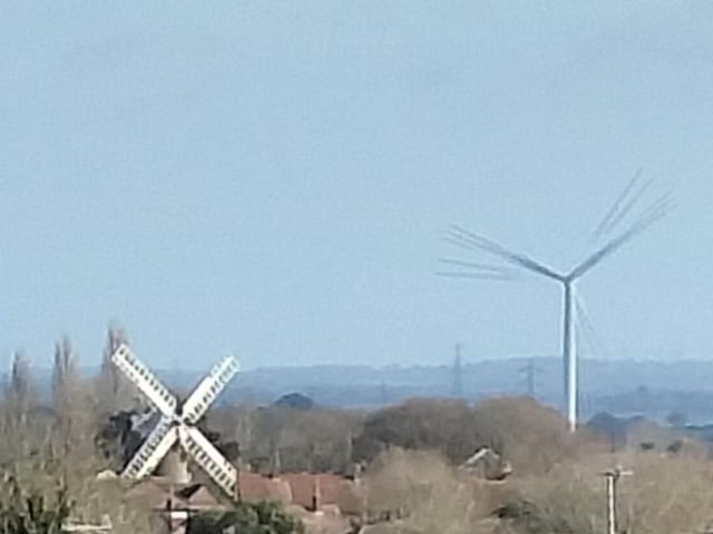 Wind tech old and new by Jackie Harvey, who snapped the Polegate windmill and wind turbines from the fields in Wannock, just off the Jevington road, SUS-220216-100028001