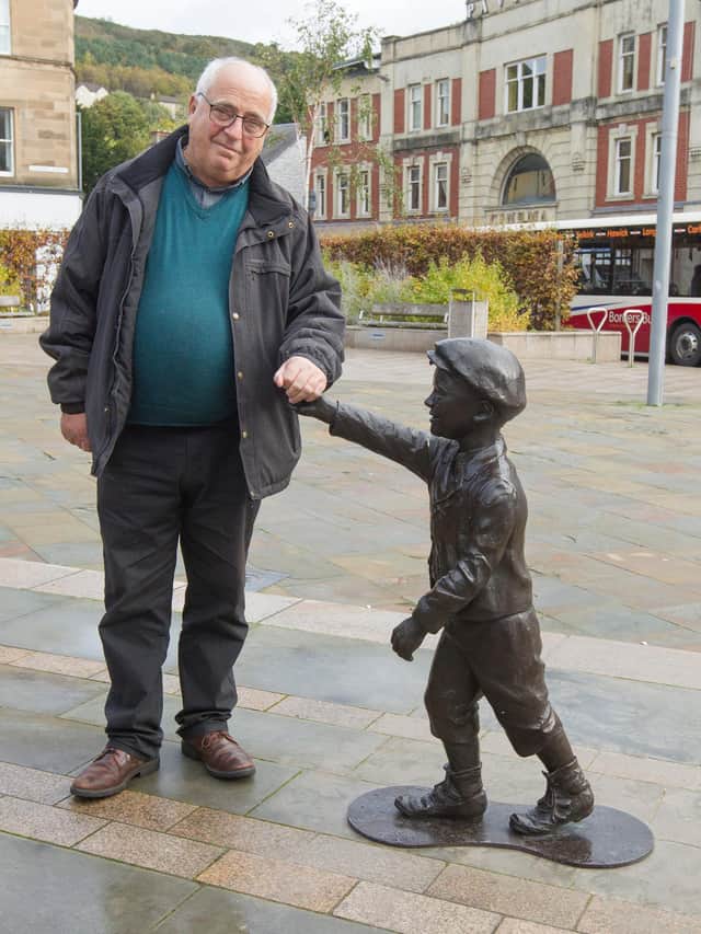Councillor Sandy Aitchison with the wee man in Galashiels. (Photo: Bill McBurnie)
