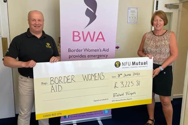Richard Forsyth, senior agent at NFU Mutual Borders presents the cheque to Carol Walker, service manager at Border Women’s Aid.
