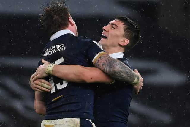 Captain Stuart Hogg and Cameron Redpath celebrate at the end of the Guinness Six Nations match between England and Scotland at Twickenham Stadium on February 6, 2021. (Photo by Mike Hewitt/Getty Images)