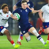 Scotland's Hector Patterson going past France's Zinedine Aouad during their countries' Under-20 Six Nations match at Edinburgh's Hive Stadium on Friday (Photo by Ewan Bootman/SNS Group/SRU)