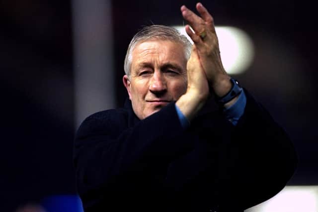 Then Scotland rugby head coach Jim Telfer applauding fans after his side's 30-18 loss to New Zealand at Edinburgh's Murrayfield Stadium in October 1999 (Pic: Ben Radford/Allsport/Getty Images)