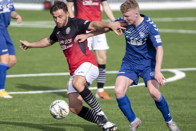 Zander Murray, left, in action for Gala Fairydean Rovers against Sauchie Juniors at Netherdale in the Scottish Cup's first round on Saturday (Photo: Thomas Brown)