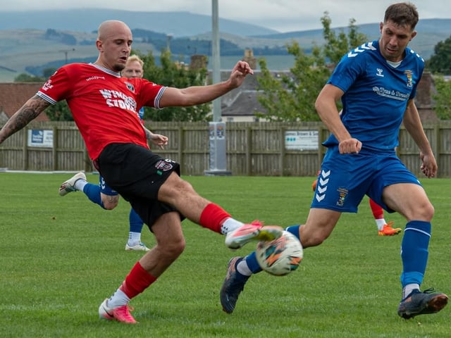 Thomas Hume on defensive duty for Coldstream during their 4-4 draw at home to Kirkcaldy and Dysart on Saturday (Photo: Julie Russell)