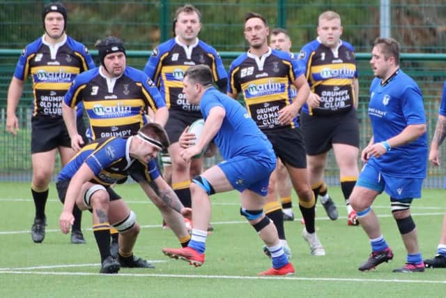 Hawick Harlequins on the defensive against Hawick Linden on Saturday at the town's Volunteer Park (Photo: Sel Messer)