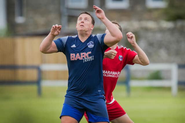 Vale of Leithen player-manager Chris Anderson in action against Hawick Royal Albert United (Photo by Bill McBurnie)