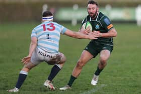 Centre Lee Armstrong, making his 200th appearance for Hawick, going round Neil Armstrong during the Greens's 26-16 win at home at Mansfield Park to Edinburgh Academical on Saturday in rugby's Scottish Premiership (Photo: Brian Sutherland)