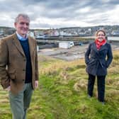 Matthias Haag, NnG project director and Christine Bell, Eyemouth Harbour Trust 's business manager at the harbour.