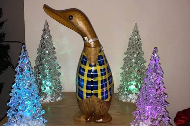 A Doddie Duck sporting his My Name’5 Doddie Foundation tartan finery.