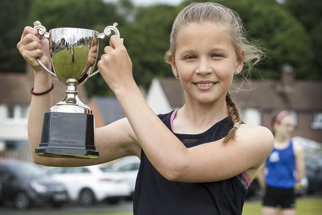 Hawick's Chloe McLeod celebrating winning the 100m race for youths aged nine to 12 at Kelso Border Games at the weekend