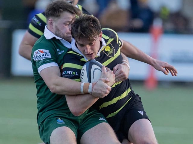 Andrew Mitchell making a challenge for Hawick as they lost 33-12 away to Melrose at the Greenyards on Saturday (Photo: Andy McLean)