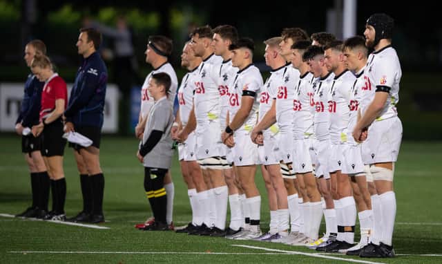 Southern Knights players stand for minute's silence in memory of Queen Elizabeth II (Pics by Paul Devlin SNS Group/SRU)