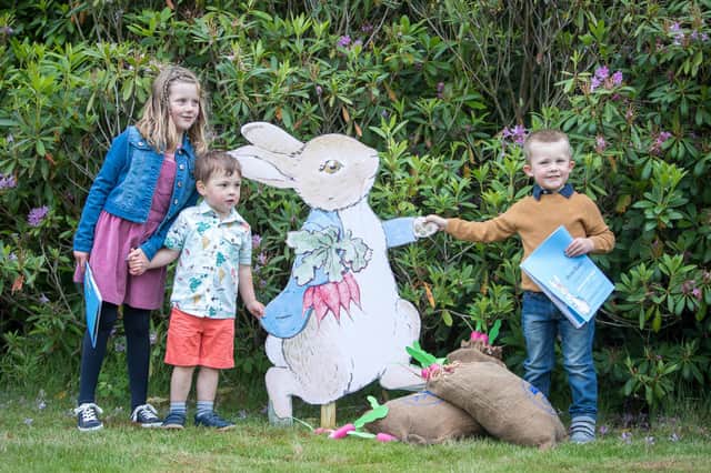 Darcy Weir, Rhu Buckley and Fergus Weir, with the naughty Peter Rabbit at Floors Castle.