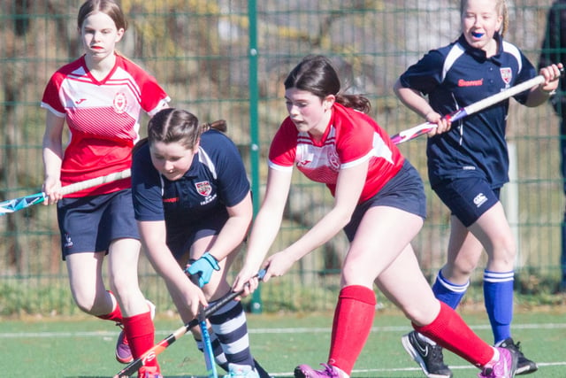 Cousins Kirsty Turnbull, from Jedburgh Grammar Campus, and Kelso High School's Georgia Thomson battling for the ball
