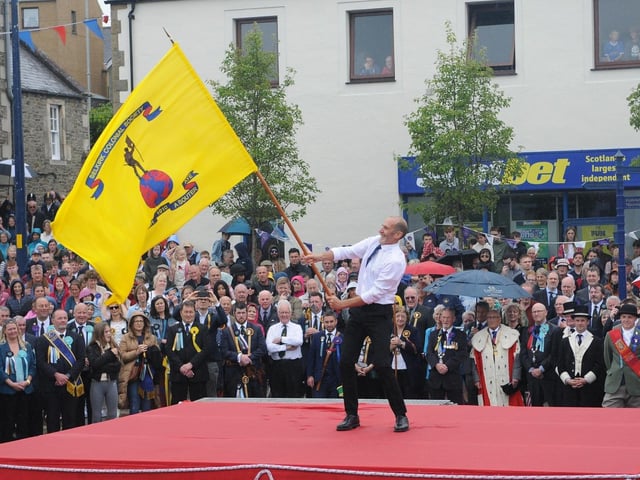 Colonials standard bearer David Hislop.