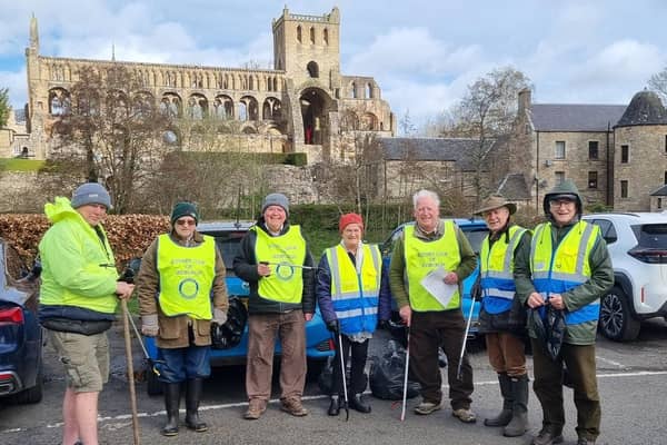 Members of Jedburgh Rotary clean up the town.