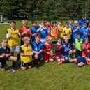 St Johnstone midfielder Murray Davidson taking a training session for the P6 and P7 squads at Leithen Vale in Innerleithen on Saturday