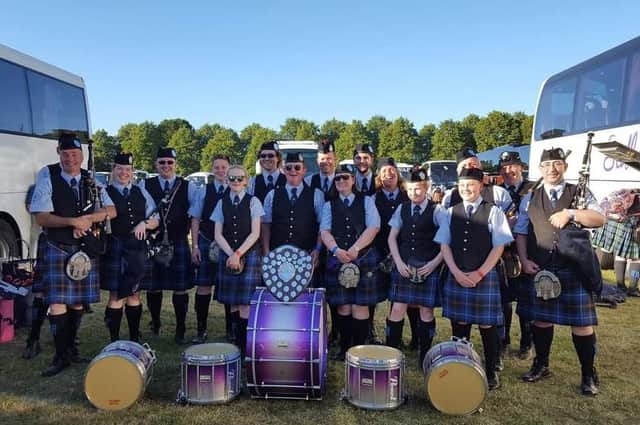 Tweedvale Pipe Band celebrating after winning Grade 4A European Championships in Forres in 2018.
