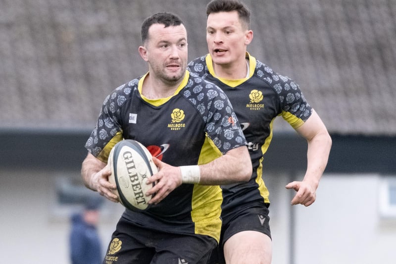 Bruce Colvine on the ball for Melrose, supported by Struan Hutchison, against Gala during Saturday's Kelso Sevens final