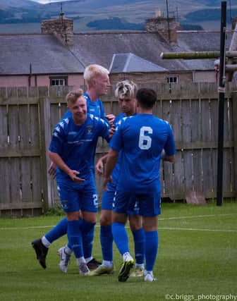 Delighted Coldstream players celebrate scoring against Edinburgh College on Saturday (Pic by Corine Briggs)