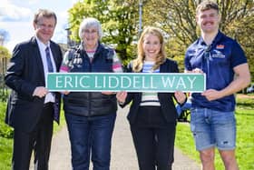 Scotland winger Darcy Graham, far right, unveiling the renamed Eric Liddell Way in Edinburgh with, from left, John Macmillan, Sue Caton and Marie-Clair Munro (Pic: Ian Georgeson)