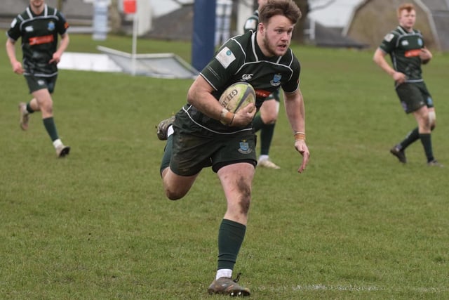 Centre Andrew Mitchell en route to scoring a try during Hawick's 36-0 Scottish cup quarter-final win at Dundee on Saturday (Photo: Malcolm Grant)