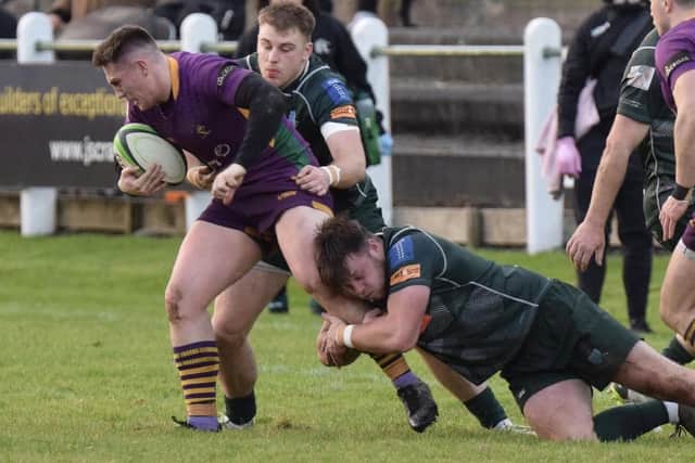 Hawick's Andrew Mitchell and Ronan McKean getting a tackle in during their team's 21-15 win at home to Marr at Mansfield Park in rugby's Scottish Premiership on Saturday (Photo: Malcolm Grant)