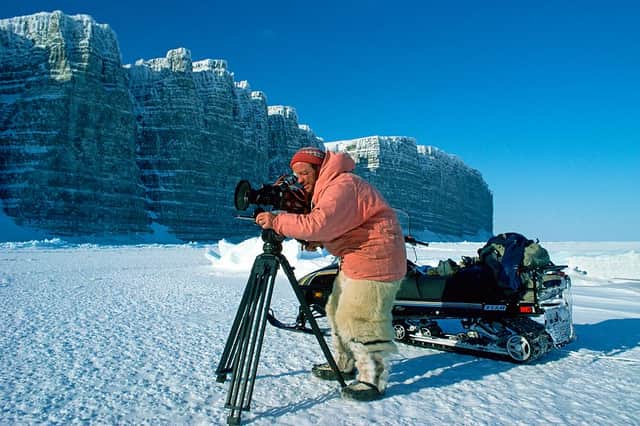 Cameraman Doug Allan on location in Prince Leopold Island, Lancaster Sound in May 1995.
