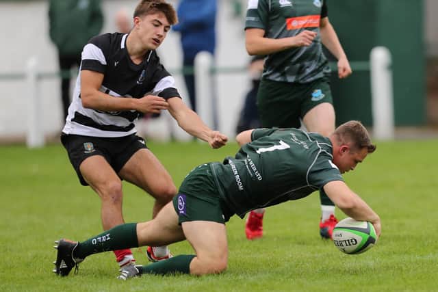 Calum Renwick scoring a try for Hawick as they beat Kelso 61-7 at home at Mansfield Park on Saturday (Photo: Brian Sutherland)