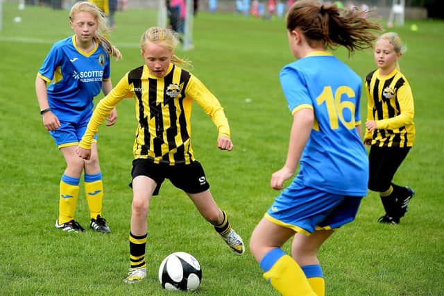 Girls' teams from Melrose and Lauder taking part in 2019's Scottish Borders Junior Football Association festival of football (Photo: Alwyn Johnston)