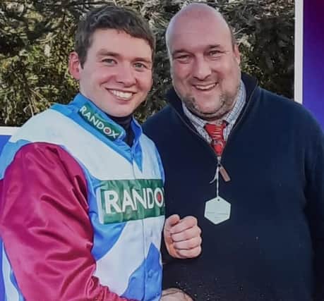 Jockey Derek Fox pictured at Aintree with Bruce Jeffrey, after winning the 2017 Randox Grand National on One For Arthur.