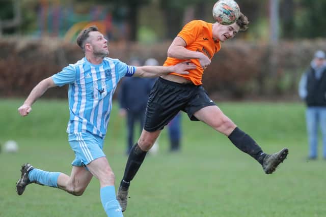 Bailey Simmons winning an aerial ball for Leithen Rovers during their 3-2 loss at home to West Barns Star in the South of Scotland Amateur Cup's second round on Saturday (Photo: Brian Sutherland)