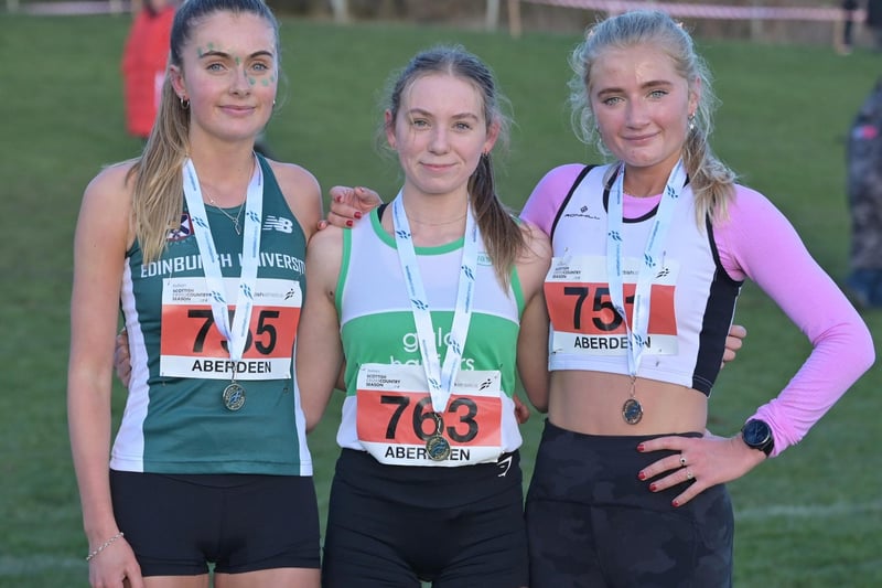 Gala Harrier Isla Paterson, centre, at Saturday's east district cross-country championships at Aberdeen with runner-up Anya Maclean, left, and third-placed Josie Wren-Golder