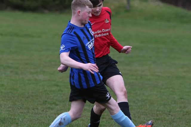 Newtown and Duns Amateurs vying for the ball at King George V Park in Newtown on Saturday (Pic: Steve Cox)