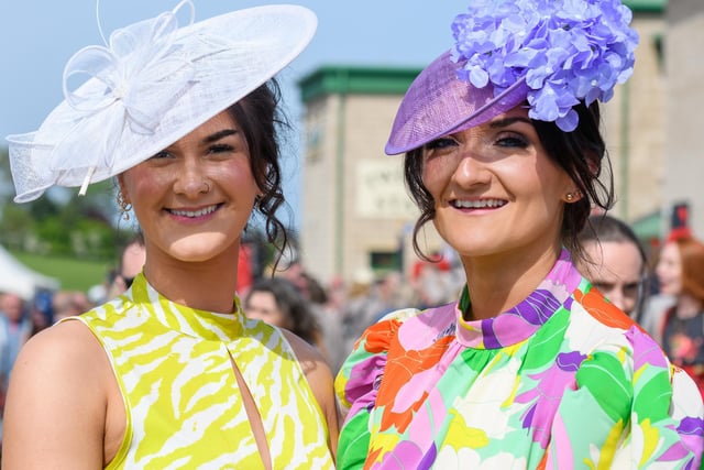 A pair of race-goers at Kelso's ladies' day season finale on Sunday